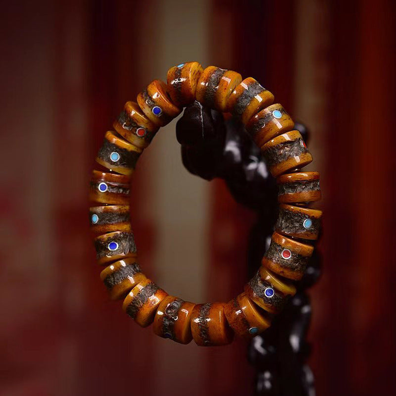 Armband aus tibetischem Yakknochen und eingelegten Mehrstein-Fassperlen – Ein Symbol für Stärke und spirituellen Schutz