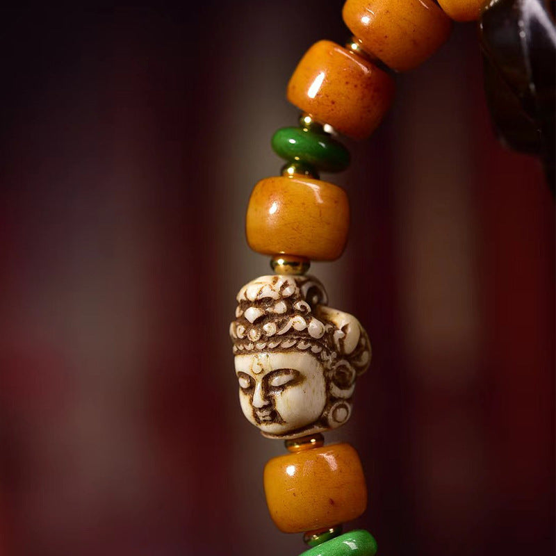 Pulsera tibetana de cuentas de hueso de yak en forma de barril con accesorio Guanyin: símbolo de compasión y bendición espiritual.