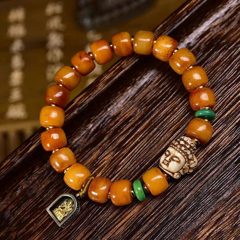 Pulsera tibetana de cuentas de hueso de yak en forma de barril con accesorio Guanyin: símbolo de compasión y bendición espiritual.
