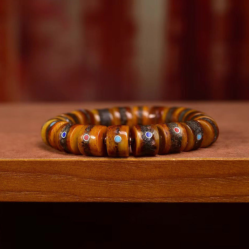 Armband aus tibetischem Yakknochen und eingelegten Mehrstein-Fassperlen – Ein Symbol für Stärke und spirituellen Schutz