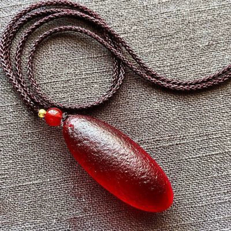 Wine Red Energy Stone Pendant – A Source of Vitality and Balance