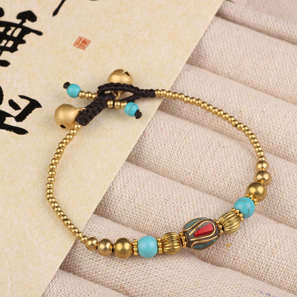 Pulsera de piedra natural de estilo étnico tibetano: símbolo de herencia cultural y energía espiritual.