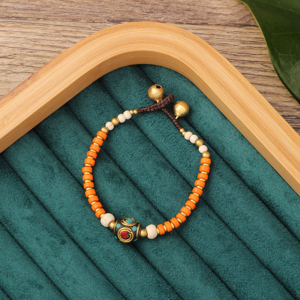 Pulsera de piedra natural de estilo étnico tibetano: símbolo de herencia cultural y energía espiritual.
